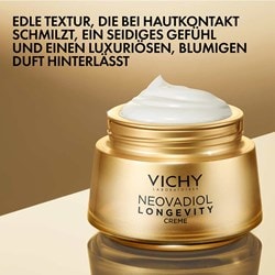 Geöffneter goldener Tiegel Vichy Neovadiol Longevity mit weißer Creme.