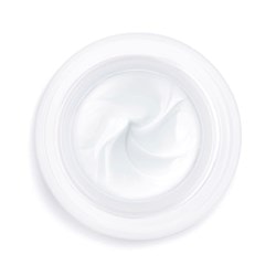 Ein Tiegel mit einer weissen Creme