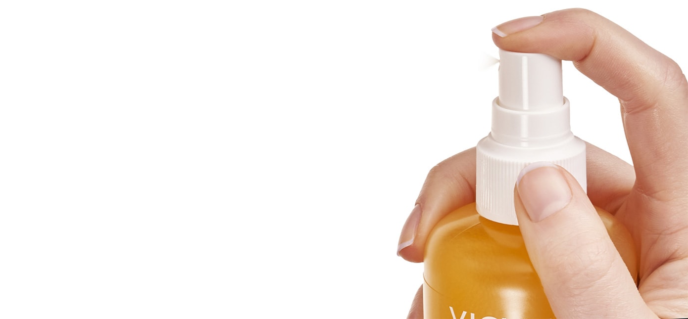 Utilisation d'un flacon de  spray.